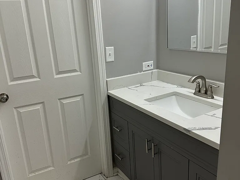 2nd floor full bathroom with two vanity sinks