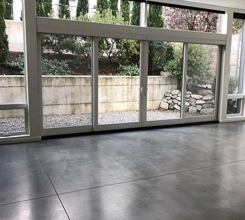 Living space, west patio doors and patio