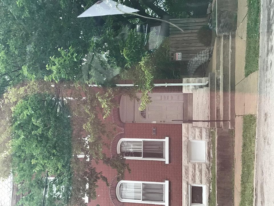 Front of building unit A is located upstairs in the back