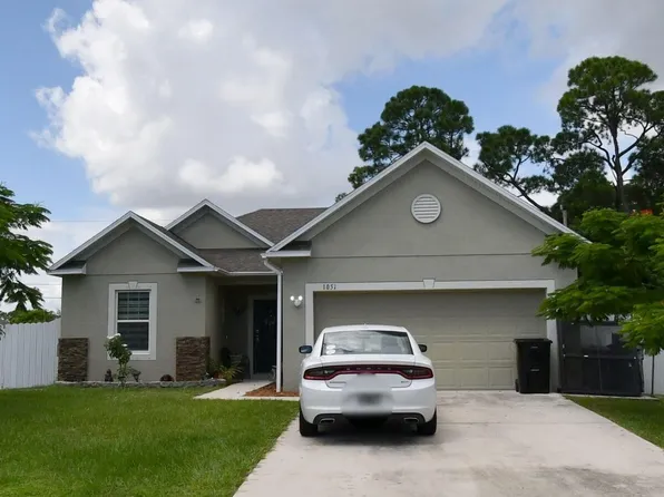 1051 SW Longfellow Road, Port St Lucie, FL 34953