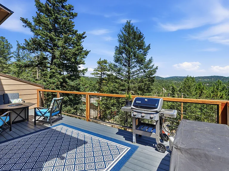 Colorado living at its best. Grill, lounge around the fire table, or enjoy breathtaking mountain sunsets from this incredible entertaining space