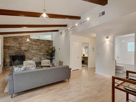 Front living area. Front door and office to the right, back yard to left.