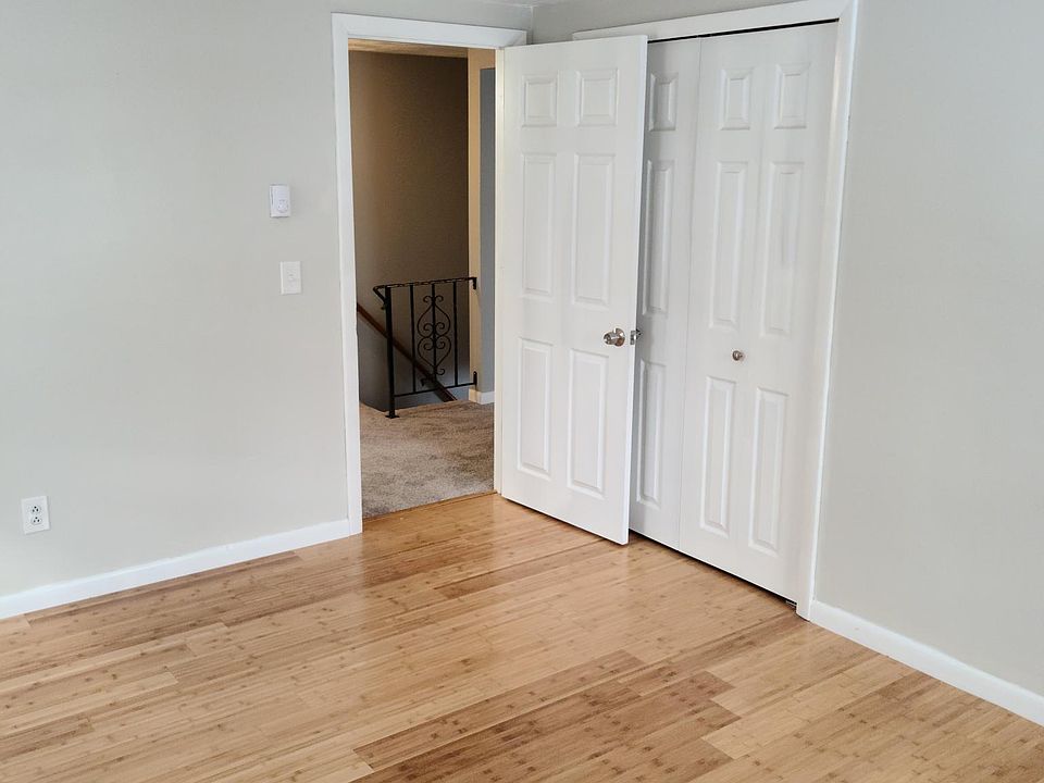 Rear Bedroom 10' 5" X 13' with new hardwood floor