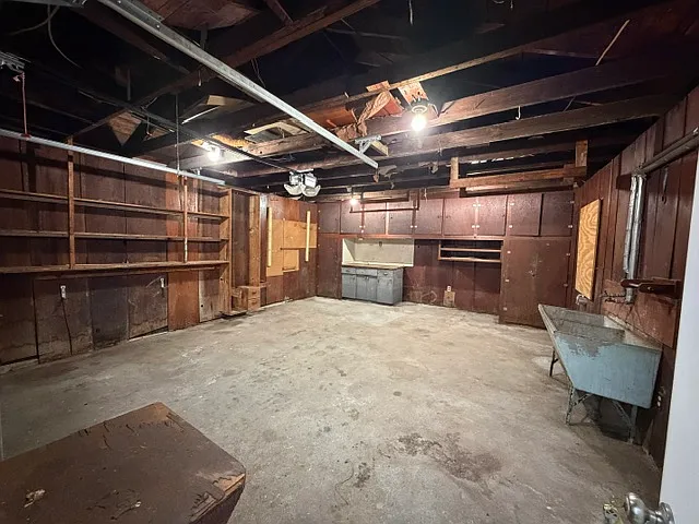 Lots of storage available here! Wash tub/bin. Electric garage door opener.