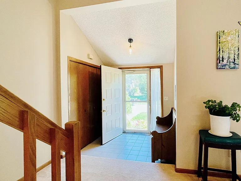 Front Door Entry. The seating bench in the entry could be left for tenant use upon request.