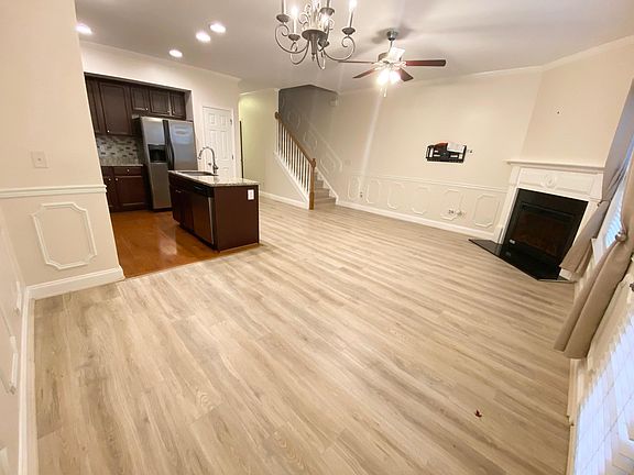 Living room, dining area, and kitchen area