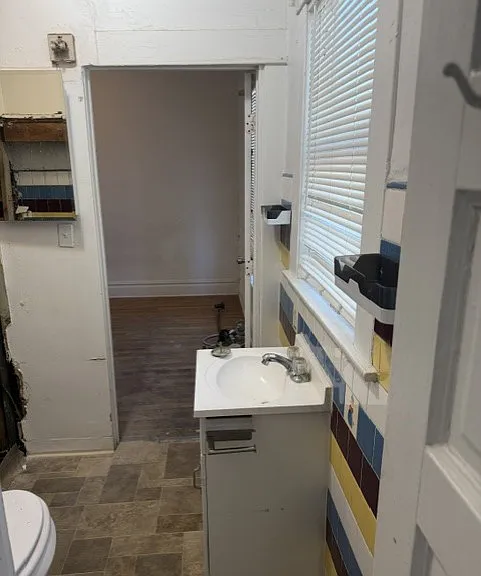 Jack and Jill bathroom - in process of renovation. New vanity, tile, toilet and shower will be completed by the time of move in