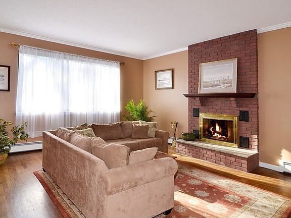 Living Room with lots of light and fireplace