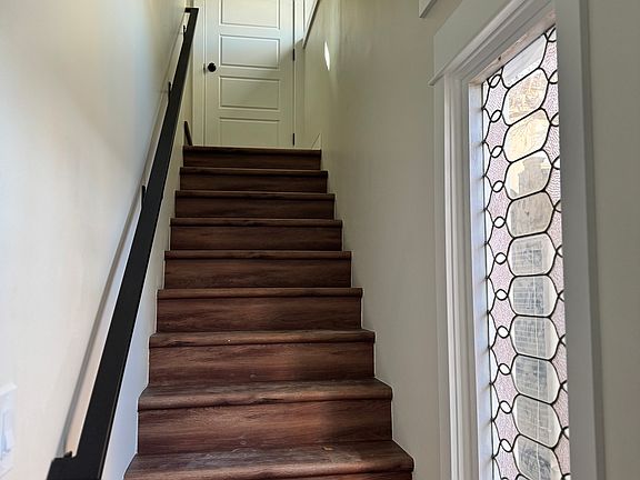 Entry stair with historic leaded glass