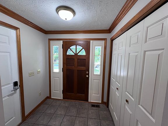 Front door has huge coat closet.