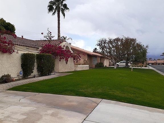 Front Lawn & space for multiple cars to park outside Garage