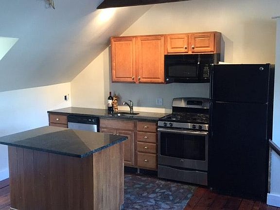 Stainless appliances with granite counter tops and island
