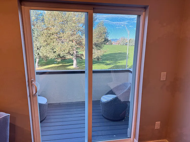 Second floor patio with park and mountain views
