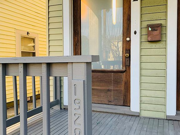 Door and mailbox with motion sensor lighting.