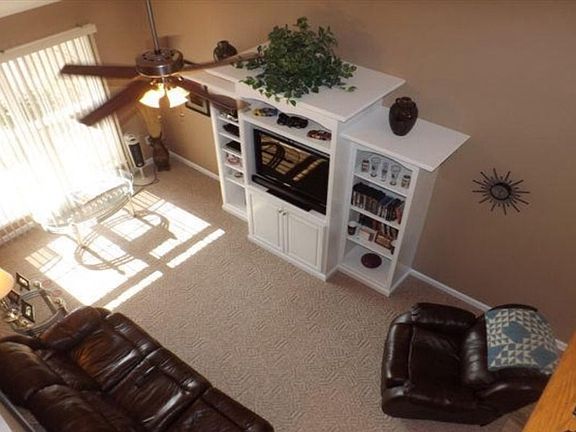 Open loft area looks down to the living room. Custom built e