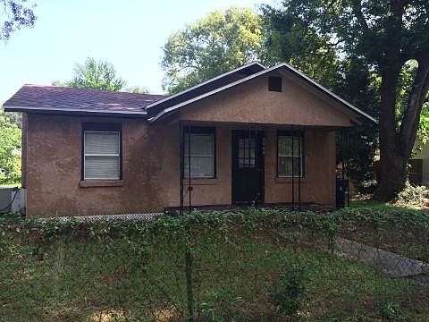 Picture of home prior to new exterior painting.