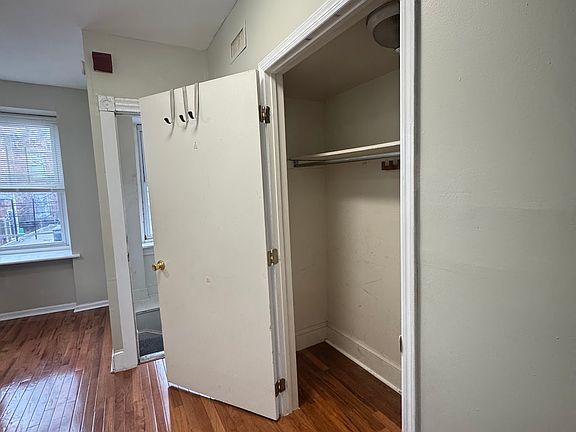 hallway with large closet