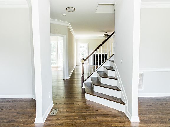 Rich hardwoods throughout lower level