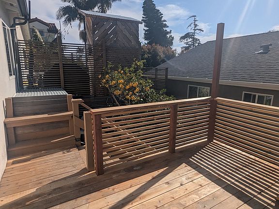 Private sunfilled deck facing West with bbq and access to communal washer / dryer