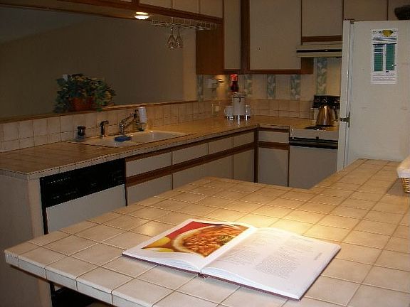 Easy care tile counter tops in efficient kitche