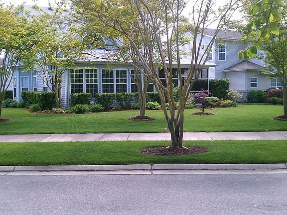 rear view, sunroom & porch 