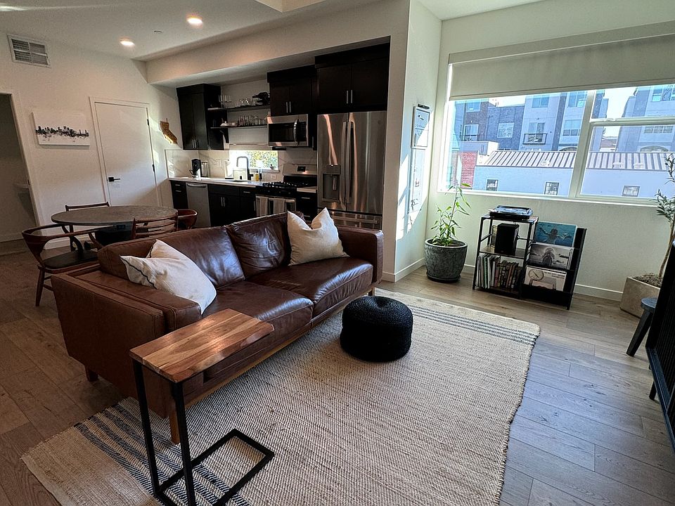 Living, dining, and kitchen. Half bath and pantry along wall