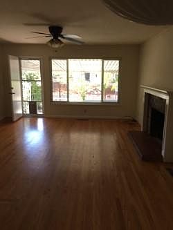Dining and living room area looking into backyard