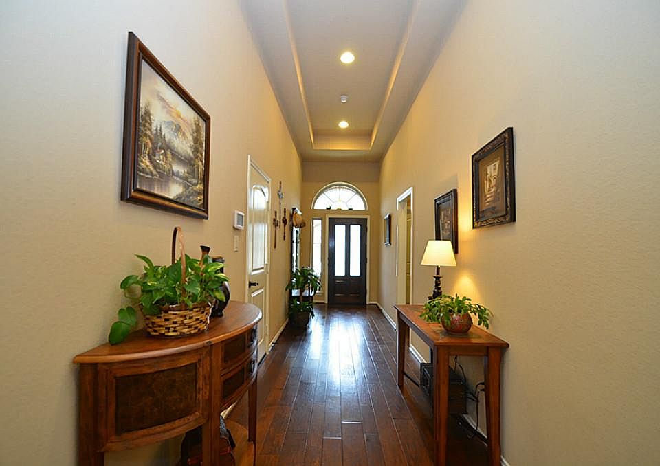 Welcoming entry with wood floors