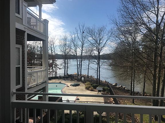 2nd Floor balcony overlooks pool and lake.