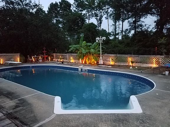 Evening by the pool there is no tenant upkeep just the enjoyment of a private pool