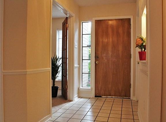 Entry foyer. Office/4th bedroom on left.