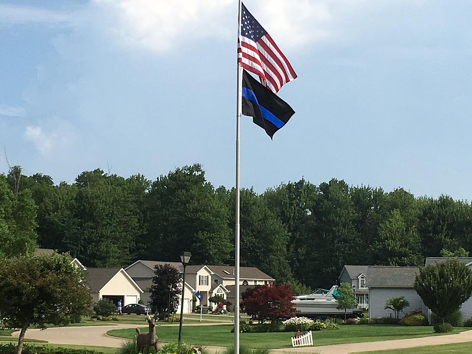 Island on grounds with flagpole