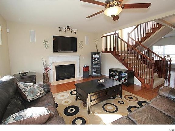Gorgeous open staircase & hardwoods & gas fireplace!