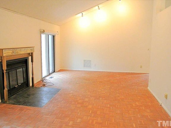 Living Room with Wood Fireplace and access to outside deck