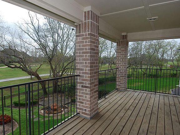 Easy access to one of the covered patios located off of the main game room area!  Great view of the golf course from the upper and the lower covered patios.