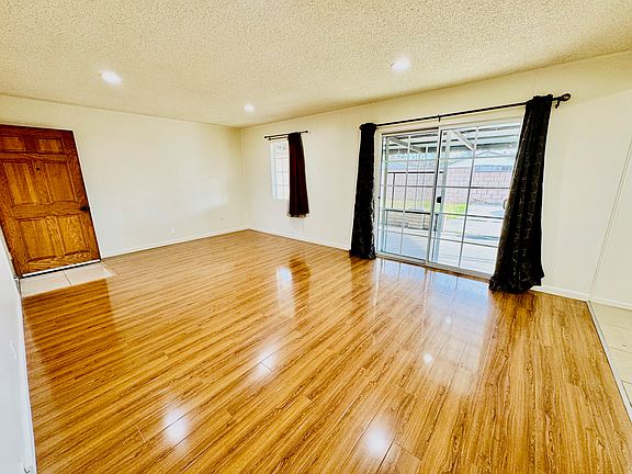 Spacious Living Room with access slidng door to the back patio