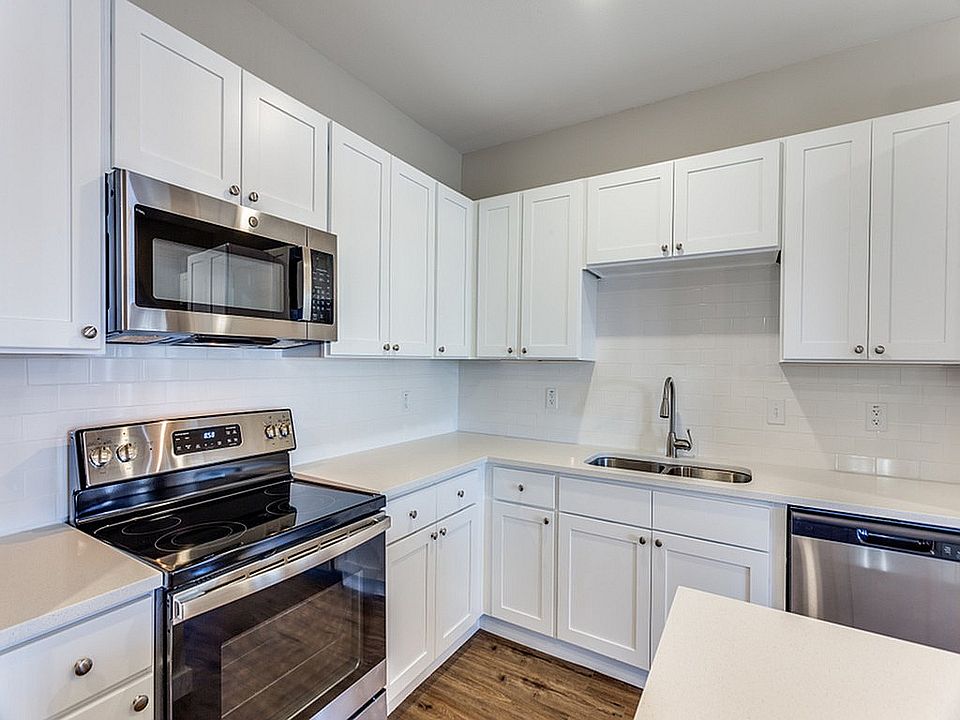 Enjoy a bright and open kitchen with ample storage and high-end details.