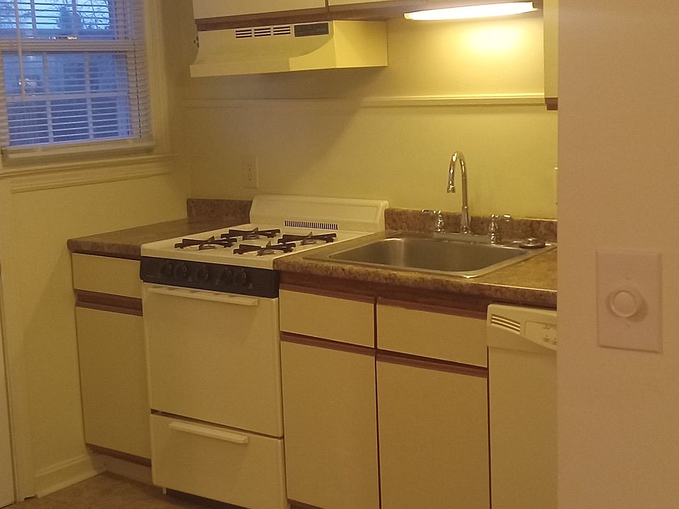 Kitchen view from living room. Kitchen fully applianced with matching stove, dish washer and refrigerator. Also includes garbage disposal. New kitchen counter and floor installed.