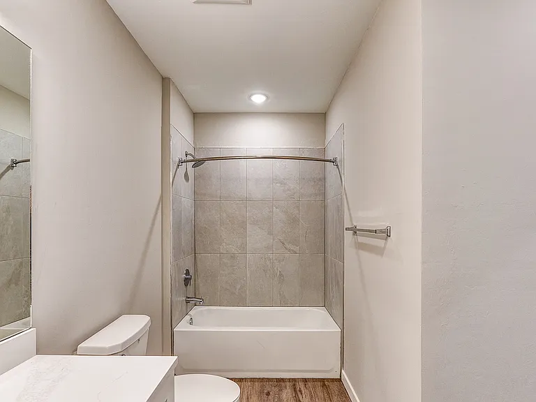 Imperial Crossing Luxury Apartment Homes unit showing a bathroom with tub.
