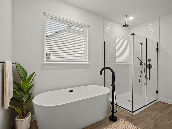 Primary bath with matte black finishes