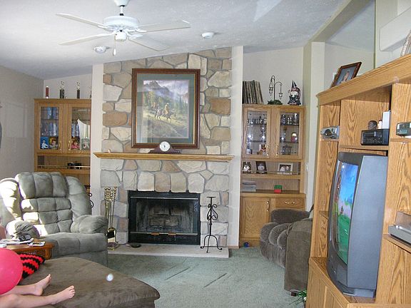 Living room w/stone fireplace