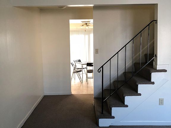 living room into kitchen