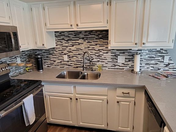5th image of 2959 N 68th Pl Unit 104