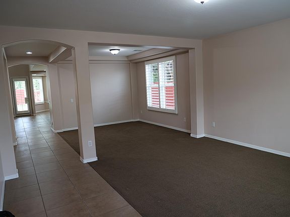 Formal living room connected to the formal dinning area.