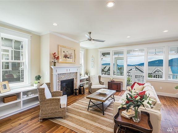 Living room leads out onto view balcony that spans the home.