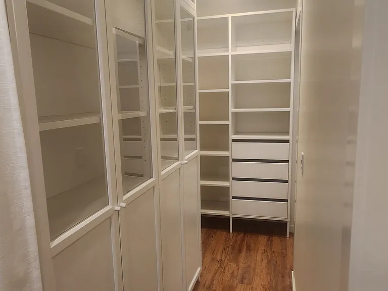 Mast bedroom walk-in closet cabinets
