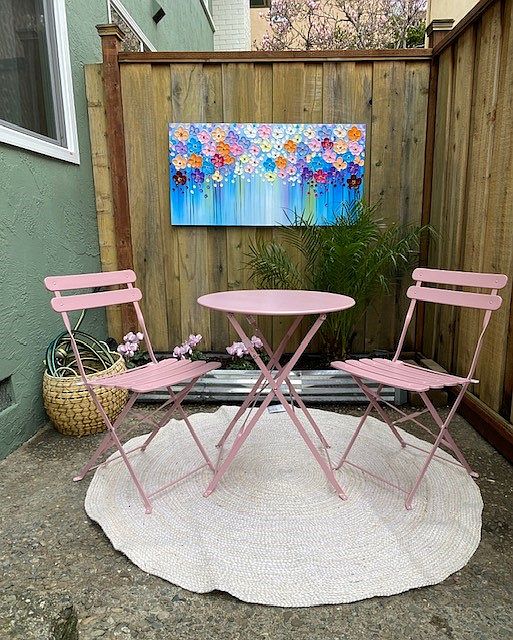 private patio/yard - right area of unit's yard- outdoor furnishings stay with unit if you like