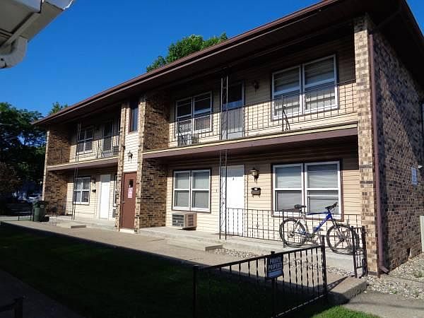 Exterior of building. Front entrance secured with deadbolt.