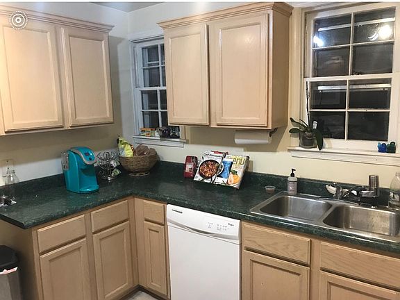 Kitchen with new floor, electric cooking, dishwasher