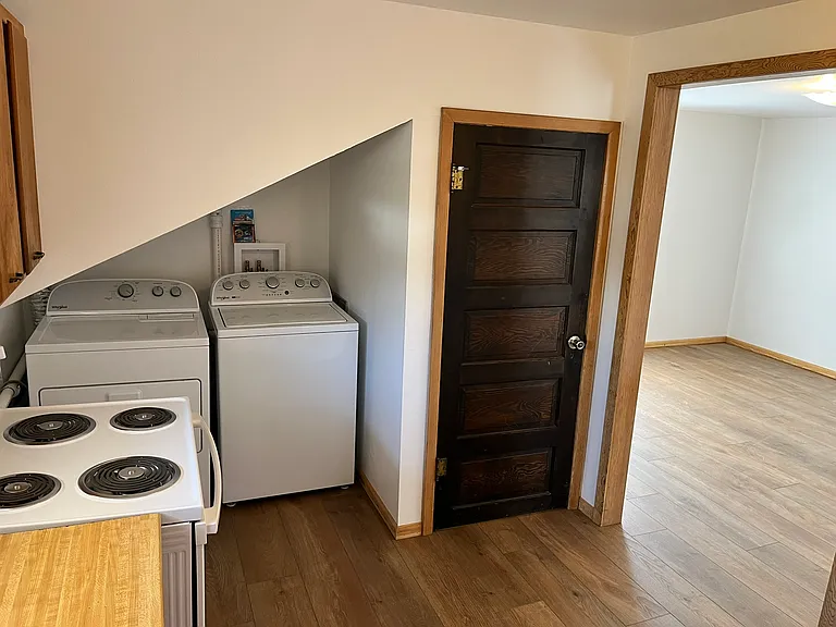 In Unit Laundry & Entrance to Family Room